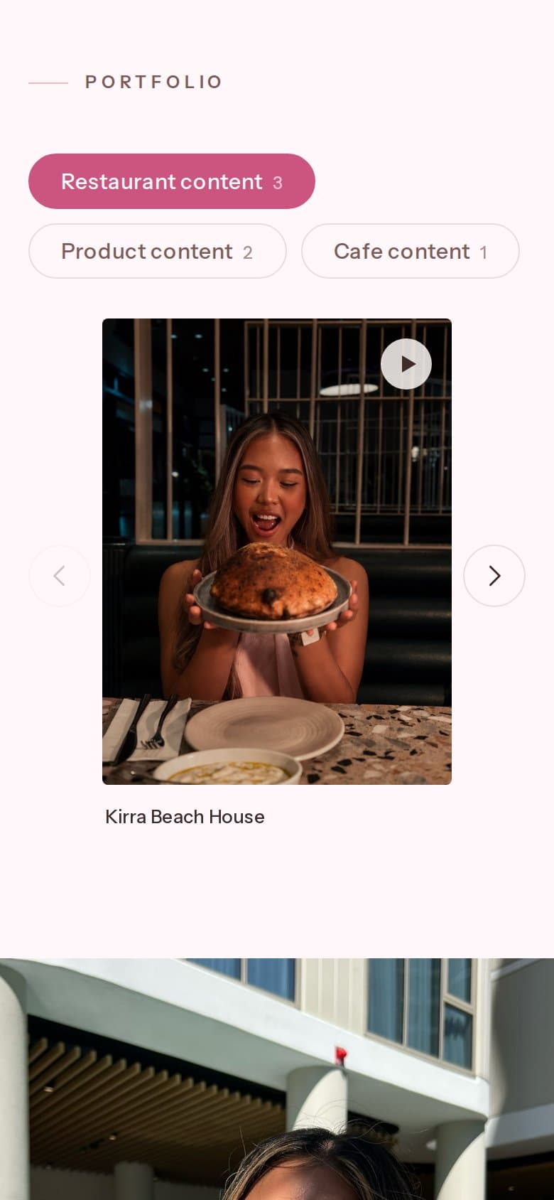 The Portfolio on a phone: the category tabs wrap onto two rows above one video tile at a time, Kirra Beach House, with arrows either side.